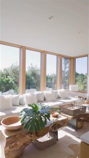 Some homes frame a view, this one lives within it