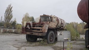 Cemetery of technology in the zone of the alienation of Chernobyl aerial photography of wrecked trucks. Pripyat. Transport that participated in the liquidation of the Chernobyl accident.