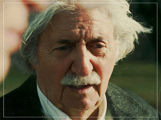 What does Einstein say to Oppenheimer by the lake in the movie?