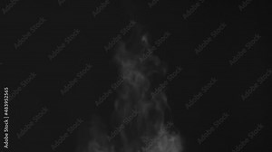 Steam from a Hot Drink in a Mug. Light warm water vapor slowly rises above the tea mug and quickly disappears against a black background