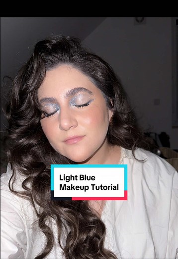 Replying to @Percy Monblanche Light Blue Makeup Tutorial #makeuptutorial #lightbluemakeup #rhinestonemakeup @Diorbeauty @NARS Cosmetics @Oribe @Color Wow Hair @YSL Beauty @urban decay @Patrick Ta Beauty @chanel.beauty @makeupforever @maccosmetics