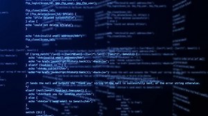 clip-1072457630-programming-code-running-over-computer-screen