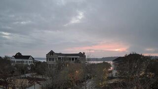 Stormy skies ignite in blaze of crimson sunset over South Carolina, USA