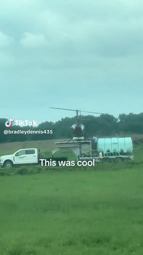 Crop Dusting Helicopter in Action