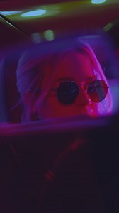 Woman fixing the rearview mirror of a car - Free Stock Video