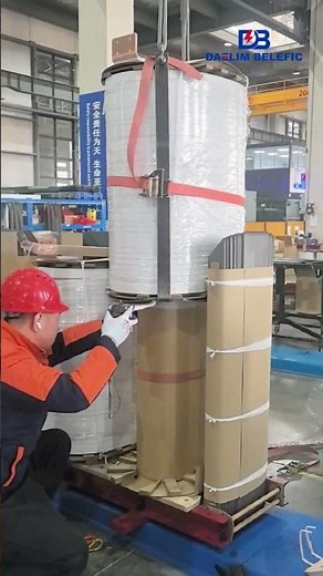 The substation transformer windings are assembled onto the iron core