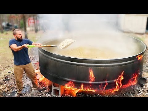 Popping 100 Pounds of Popcorn in 700 Gallon Tank Over Bonfire! | Sam & Nia