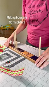 Do you use an E-Z Bow maker? It really helps if you have trouble holding all those ribbons in your hand! . #bowmakers #wreathbow #handmadewreaths | The Wreath Creator