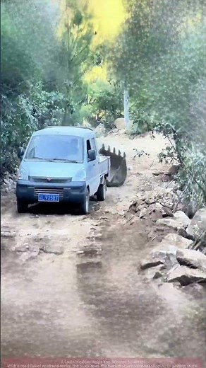 Towing a Backhoe Bucket on Muddy Mountain Road: This Truck is Super Stable