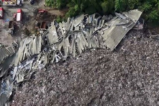 Aerial video shows scale of deadly landfill collapse as workers buried under mountain of garbage