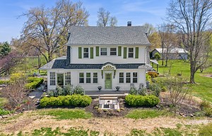 Charming 1920s Farmhouse on Nearly 3 Acres in Floyd County. Perched atop a gently rolling hill, this idyllic 1920s farmhouse blends timeless charm with modern comfort. Located in the award-winning Floyd County school district, the home offers four spacious bedrooms and two and a half baths, including a first-floor primary suite for ultimate convenience. This first floor primary suite has a separate exterior entry allowing for the potential of an owner-occupied rental. The heart of the home is a