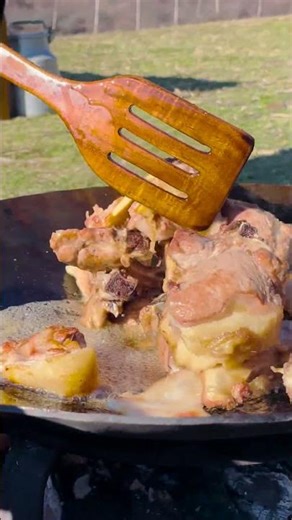 Fire-Roasted Meat and Potatoes: A Traditional Feast