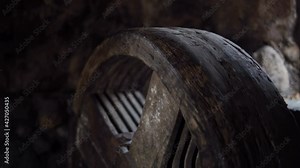 The internal mechanism of an old mill. A wheel inside a windmill or river mill. Ancient flour production. Milling of wheat, corn, rye.