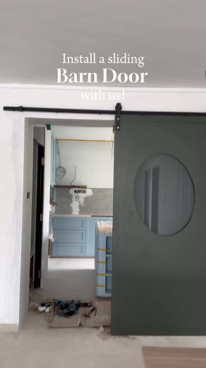 Sliding barn doors not only save space but also add a unique touch of character to any room! We especially love the off-angled peekaboo circle cut-out! #interiordesign #tiktoksg #hdbreno #bto #barndoor