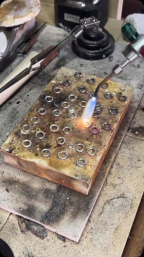 Making chain involves a lot of soldering. Many stages of soldering in fact - links are soldered, hammered, cut, linked and soldered again! Handmade chain is the best there is though. Every link has been crafted and attended to. This one is going to be a charm bracelet and is presently tumbling around in the tumbler. Just type CHAIN in the comments below and I’ll send you a direct link to see my handmade chains on my website 😁 #lavidalocajewellery #handmadechain #chainbracelet #charmbracelet #si