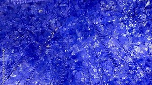 Footage video of beautiful blue sapphire and purple amethyst gemstones crystal lamps, with shimmering reflection texture. Seamless diamond gemstone crystal background texture