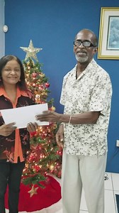 Congratulations to our Christmas Chaos 2nd place winner Indra Maraj. Here she is receiving her prizes from Wade Wattley | Music Radio 97.1 FM (Trinidad & Tobago)