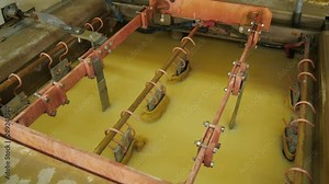 Galvanic bath, Engineering production. Circuit board in galvanic bath in the workflow