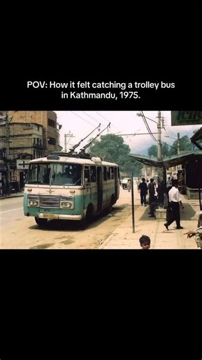 How it really felt catching a trolley bus in Kathmandu, 1975 — the gentle buzz of electric wires overhead, the breeze carrying dust and stories, the quiet chatter of passengers finding their morning rhythm. A slower city, softer moments, and a kind of peace you only notice when you look back in time. Every ride felt like drifting through an old Kathmandu that lived between calm streets, warm sun, and memories that still breathe through these photographs. #fyp #nepal #vintagevibes #oldkathmandu #