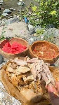 Whole Chicken in a Forest Oven in Nature