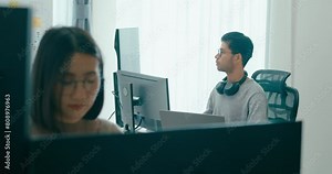 Group Adult Asia male, female freelance typing write prompt AI bot IT app smart program nomad, video game, terminal with coding language, user interface, designer, big data center on desktop computer.