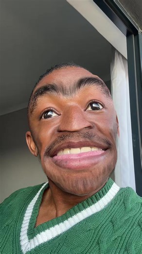 Captivating Indoor Style in a Green Sweater