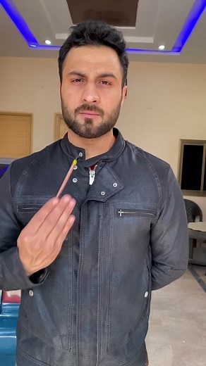 Pencil Levitation Trick in Garage Scene