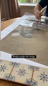 ✨DIY Tapestry✨ I wanted a tapestry from Anthropologie but it was too big for my space, so instead I made my own custom sized tapestry using some free art I downloaded, fabric, and a modge podge image transfer. I saved the details in my stories as I know you all are going to want to make this! What do you think, does it look like the real deal? | Erin Zubot Design