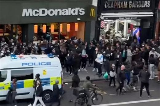Shoppers shelter in stores while teenagers cause mayhem in Clapham
