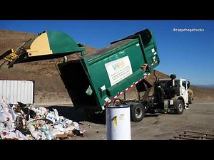 Garbage Trucks Unloading at the Dump