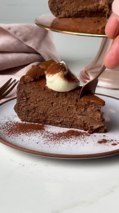 There's a very unexpected ingredient that dials up the decadence of this chocolate Basque cheesecake. Find out what it is here: bit.ly/3PT4ngC | delicious. Australia