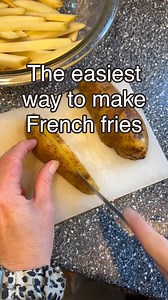 The easiest way to make French fries. Making them in the Air Fryer is easier and healthier than deep frying them. It costs about $1.28 to make these fries and the recipe makes 6 servings. Save this post so you can make these fries anytime you want! INGREDIENTS FRIES: 4 large russet potatoes 2 Tablespoons olive oil Salt to taste Pepper to taste Garlic powder to taste FOR SERVING: Freshly grated parmesan cheese Ketchup Ranch dressing INSTRUCTIONS PREP POTATOES: Wash potatoes, peel them if desired,