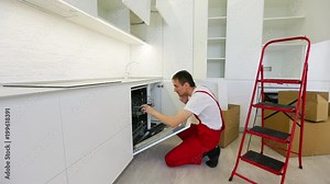 Installing a new kitchen a domestic flat pack kitchen