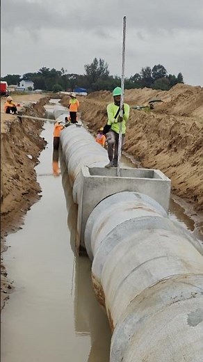 Surveying Secrets: Checking Pipe Level for Perfect Drainage Grade!