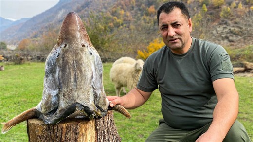 Fish soup cooked with a burning log | Giant fish head recipe