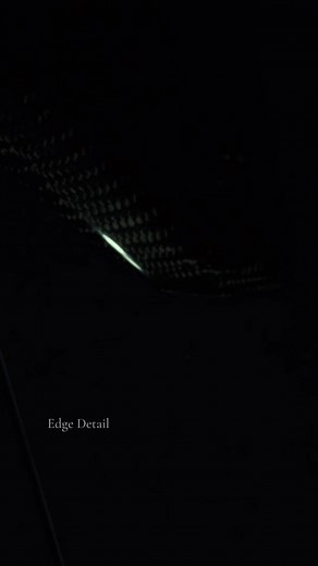 Testing how a soft side light reveals the edge line on real carbon fiber. This thin highlight shows the surface quality and the layers beneath. Every part has its own character when viewed this close. | 孟庆东