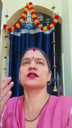 Shabari is engrossed in singing Ram's praises.