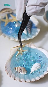6.4K views · 184 reactions | ✨ Bringing the ocean’s beauty into our craft! We’ve combined delicate shells with shimmering resin to create a unique, mini masterpiece. Perfect for adding a touch of coastal charm to any space!  #Resiners #ResinArt #HandmadeWithLove #CraftRave | Resiners_official | Facebook