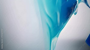 Blue Liquid Splash. A mesmerizing blue liquid splash with droplets suspended in mid-air against a light background. It captures the ephemeral beauty of motion and the interplay of light and liquid.