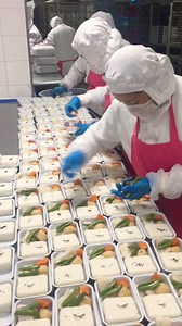 585K views · 932 shares | Have you ever thought about how your in-flight meals are prepared? Take a peek at how the speedy masters from China Eastern Airlines put together the food you eat while in the air #MissionImpossible | CGTN | Facebook
