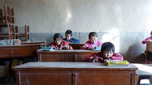 One in three Chinese children faces an education apocalypse. An ambitious experiment hopes to save them