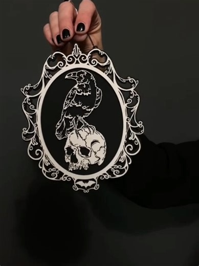 Some pieces just belong in every Gothic corner 🖤 This handmade wall decor is all about moody details. The raven perched on a skull brings subtle dark elegance and a touch of witchy vibes to your Gothic interior, bookish shelves, or moody space. Perfect for anyone who loves Dark Academia, Gothic Home Decor, or handcrafted pieces that quietly steal the spotlight. #vintagestyle #darkaesthetic #darkacademia #gothdecor #gothic