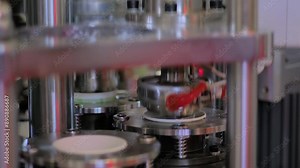 Fully automatic high-speed paper cup making machine is working for manufacturing coffee cups at plant, factory, exhibition - close up view. Equipment, technology, industrial, and production concept Stock Video