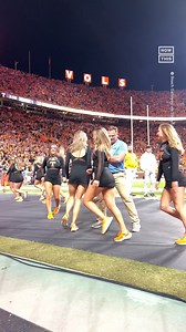 9.7M views · 36K reactions | Fans at a Tennessee Volunteers football game were treated to a killer routine when a ‘security guard’ on the field busted some moves with the university’s dance squad. Now, in reality, the moment was pre-planned and the security guard wasn’t really a guard at all, but rather another dancer in disguise — but that doesn’t make it any less fun to watch! | NowThis | Facebook