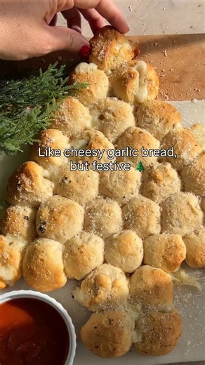 Gina Gibson | Easy Family Recipes on Instagram: "Mozzarella-Stuffed Biscuit Christmas Tree 🎄 Soft @pillsbury biscuit dough stuffed with melty mozzarella, brushed with garlic-herb butter, and baked into the cutest Christmas tree. Serve it warm with ranch, marinara, or pizza sauce — guaranteed crowd-pleaser. What you’ll need: • 1 can Pillsbury biscuit dough (8 biscuits) • 5 mozzarella sticks, cut into 32 pieces • 2 tbsp butter, melted • 1 tsp garlic powder • 1 tsp Italian seasoning • 3-4 tbsp gra