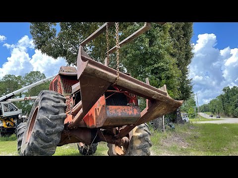 Removing parts off a Timberjack skidder! I accidentally hurt Wiley!