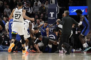 Punches thrown, 5 players ejected in mass brawl marring Magic's victory over Timberwolves