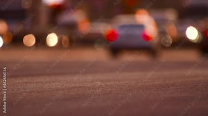 Abstract sunrise over road busy street vehicle traffic sunset city background. Abstract city crowded car moving road traffic avenue. Urban street cars traffic city road sunset. Blurry cars slow motion