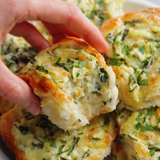 54K views · 448 reactions | Cheesy Spinach and Artichoke Pinwheels - Everyone’s favorite spinach and artichoke dip in these cheesy, creamy BAKED roll ups!!! So good for GAME DAY!!! RECIPE: https://damndelicious.net/2017/09/27/cheesy-spinach-and-artichoke-pinwheels/ | Damn Delicious | Facebook