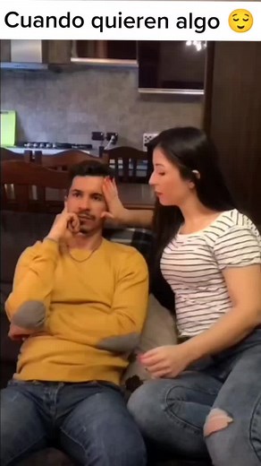 Lighthearted Couple Moments in a Cozy Living Room